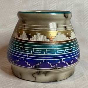 Horse hair Navajo pottery with etching throughout.